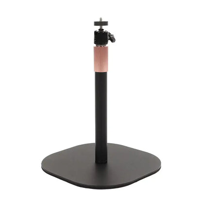 Modern black and rose gold decorbites adjustable height monitor stand with textured middle section and adjustable head