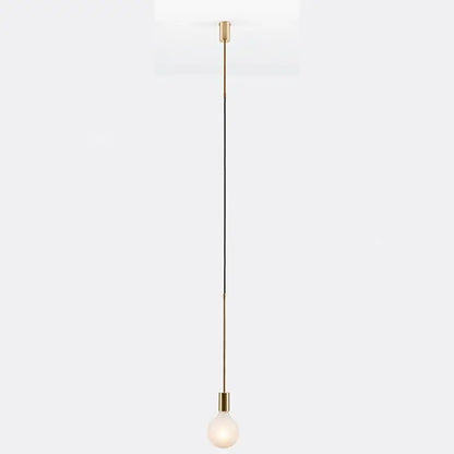 Modern black rose gold minimalist pendant light with brass rod and frosted glass bulb for dining room decorbites black rose