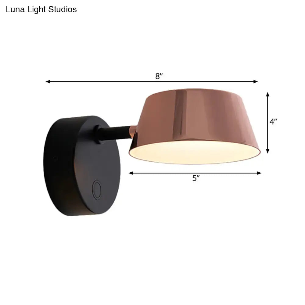 Copper-finished modern black and rose gold sconce light with adjustable arm and black base for living room direct wired use maximum bulb wattage