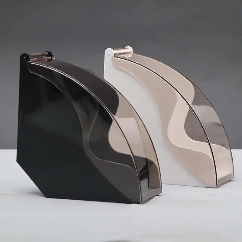 Modern black and rose gold wave coffee filter dispenser with glossy curved bookends for kitchen storage