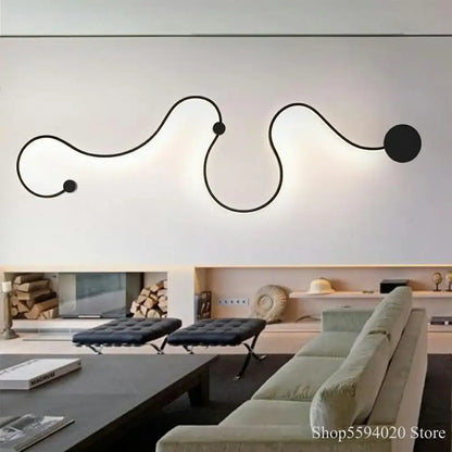 Modern black serpentine led wall lamp with sleek curved lines and spherical accents for living room use