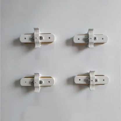 Modern black and silver ceiling track rail connector set with white plastic wall bracket and beige wooden insert for decorbites ceiling track