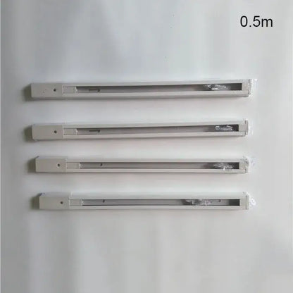 Four white aluminum track lighting fixtures 0.5m long with visible components for decorbites ceiling track rail connector set