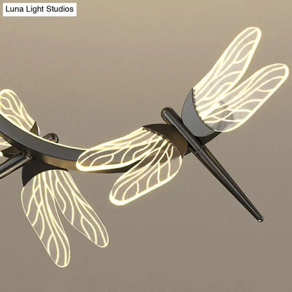 Modern black dragonfly-shaped ceiling light with translucent veined wings and stepless dimming for restaurant ceilings