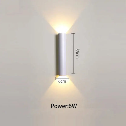 Modern black and silver led wall lamp with white cylindrical design for bedroom or tv background lighting