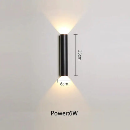 Modern black and silver led wall lamp with lone line design and two warm white downward beams for bedroom or tv background