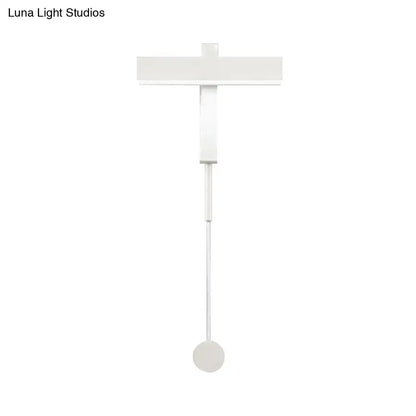 Minimalist white wall lamp with adjustable arm and bulb base featuring a sleek modern design for bedroom use