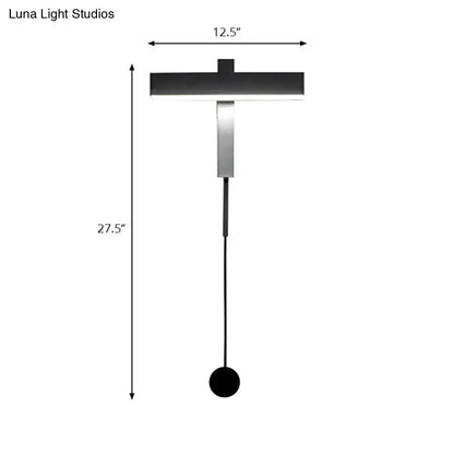 Modern black and silver led wall lamp with adjustable arm, sleek horizontal bar, vertical stem, and bulb base for bedroom use