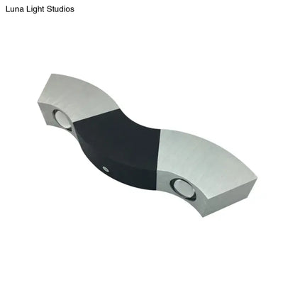 Modern black and silver led wall sconce with dual-light fixture width 10in and sleek curved design for living room