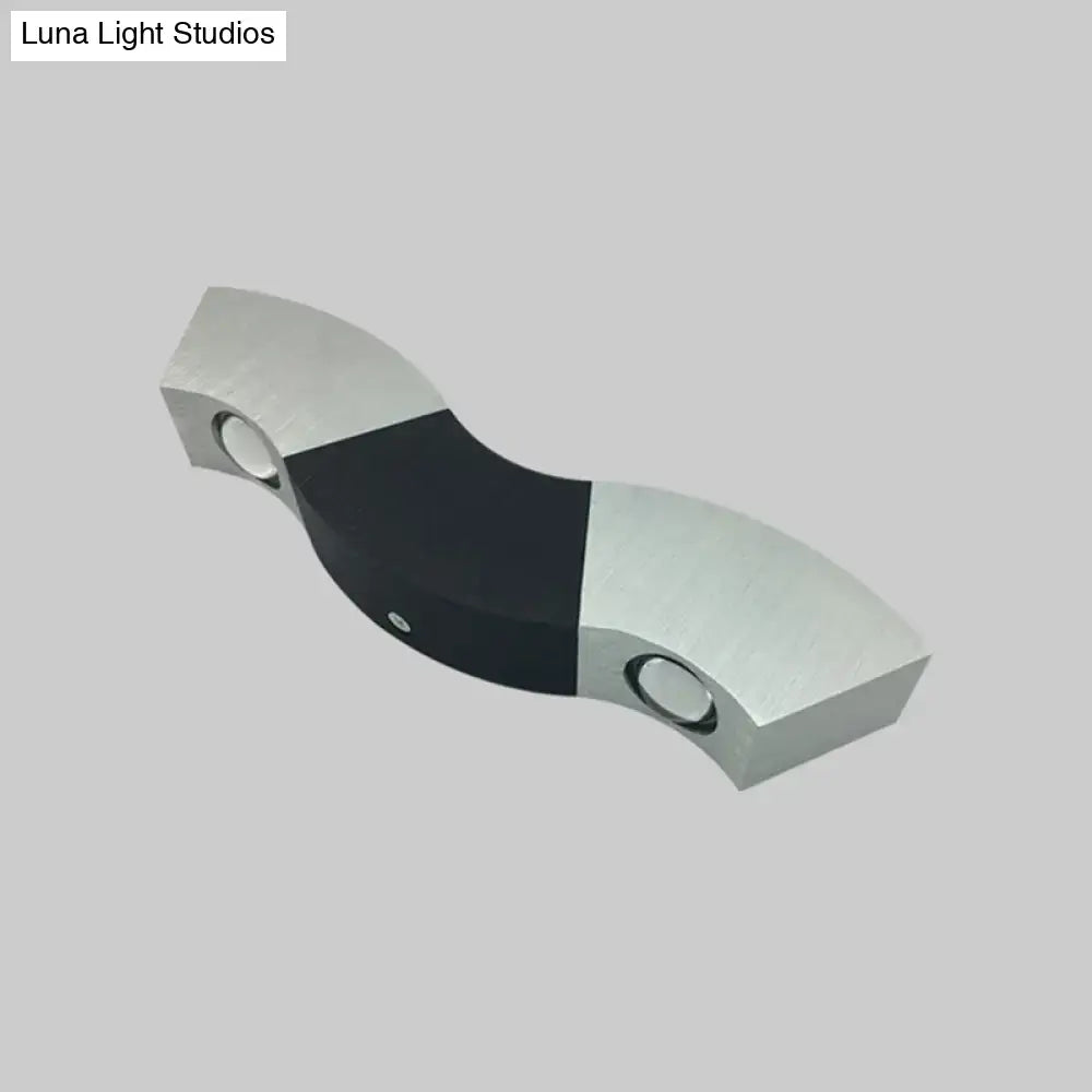 Modern black and silver led wall sconce fixture with sleek curved design and 10in width for living room lighting
