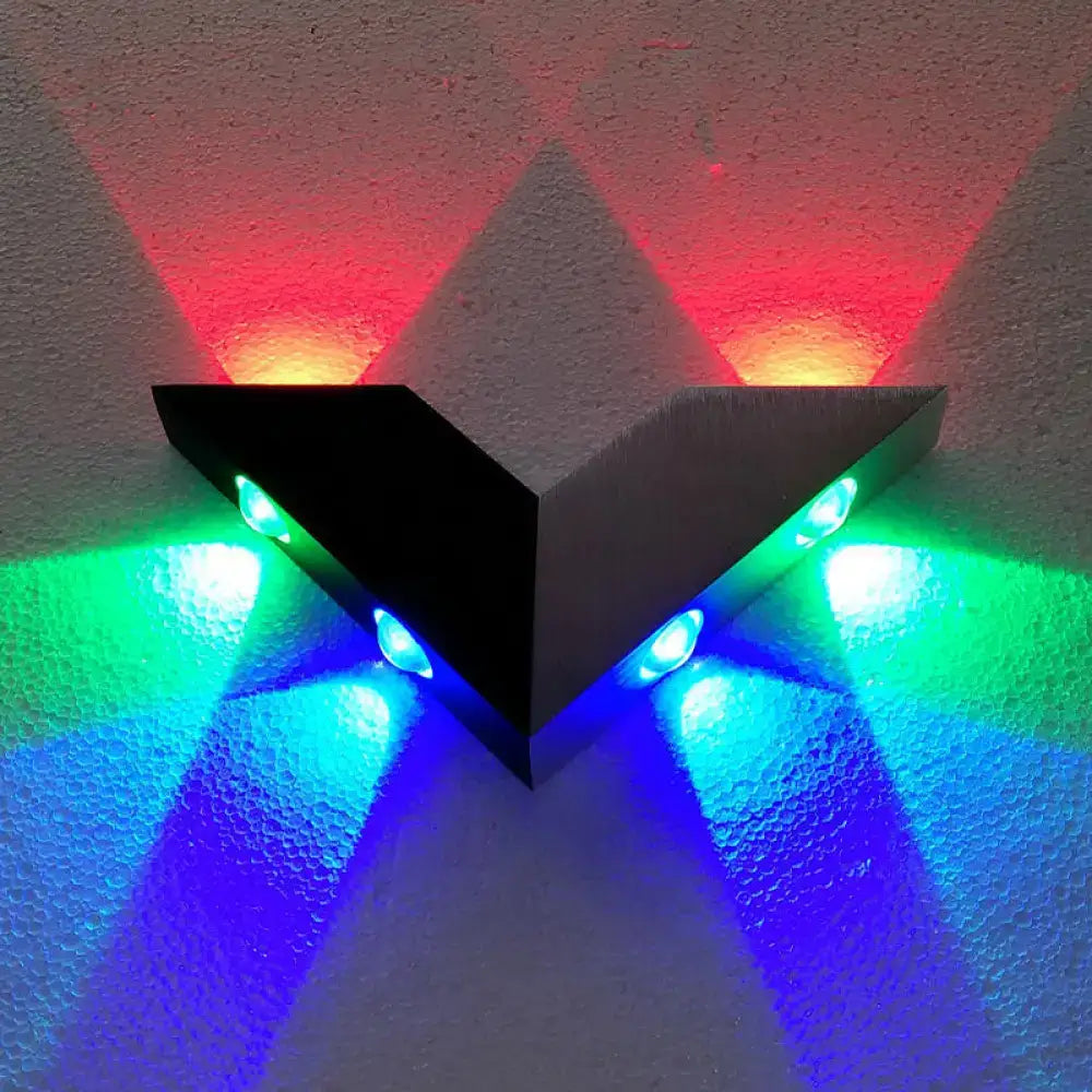 Modern black and silver metal sconce led wall light with rgb beams casting red green and blue for bedroom decor