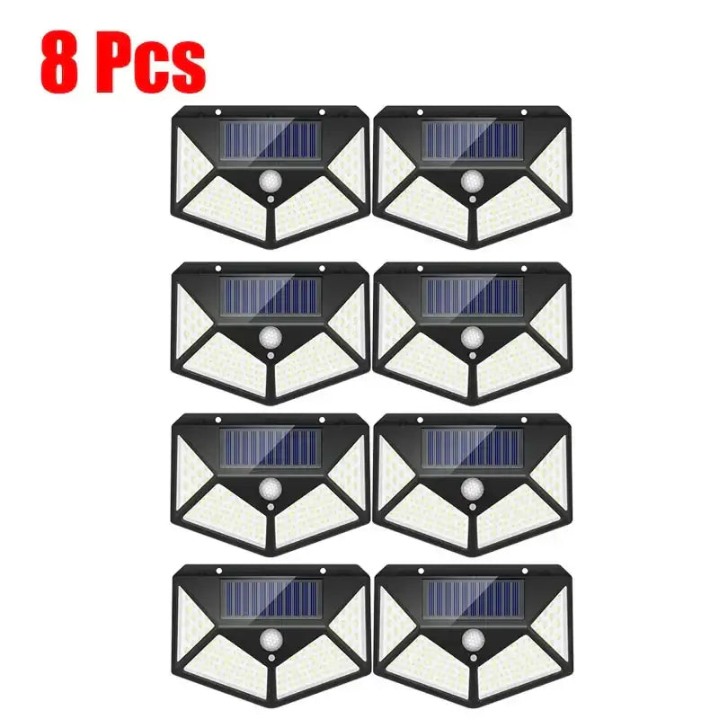 Modern black solar powered outdoor wall lamp set of eight with white led panels and blue solar cells for garden use