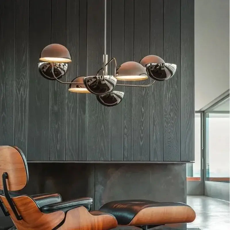 Modern black spherical abstract art chandelier with five polished bronze dome shades and sleek chrome frame pendant lamp