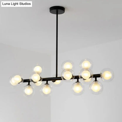 Modern black metal chandelier ceiling light featuring multiple clear spherical glass globe bulbs for dining room use