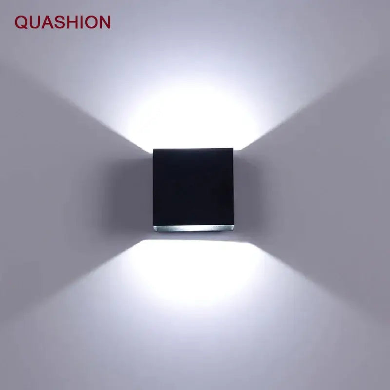 Modern black square 12w cob led wall lamp with sleek metallic base emitting bright focused beams for living room decorbites 12w cob led