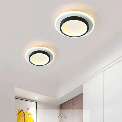 Modern black square led ceiling lamp with sleek white and black circular lights emitting warm ambient glow decorbites led ceiling