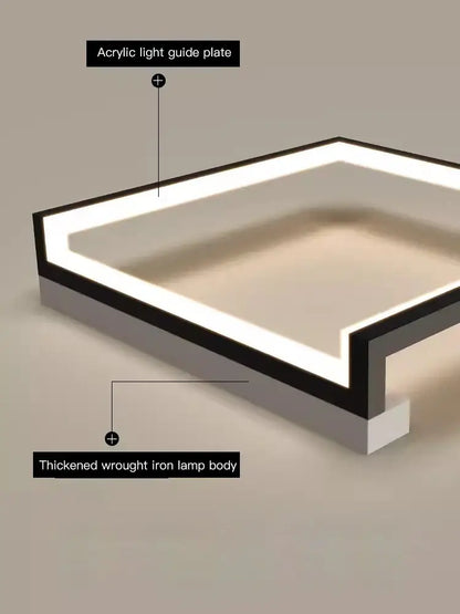 Modern black square led smart chandelier with sleek black wrought iron base and glowing white acrylic light guide plate