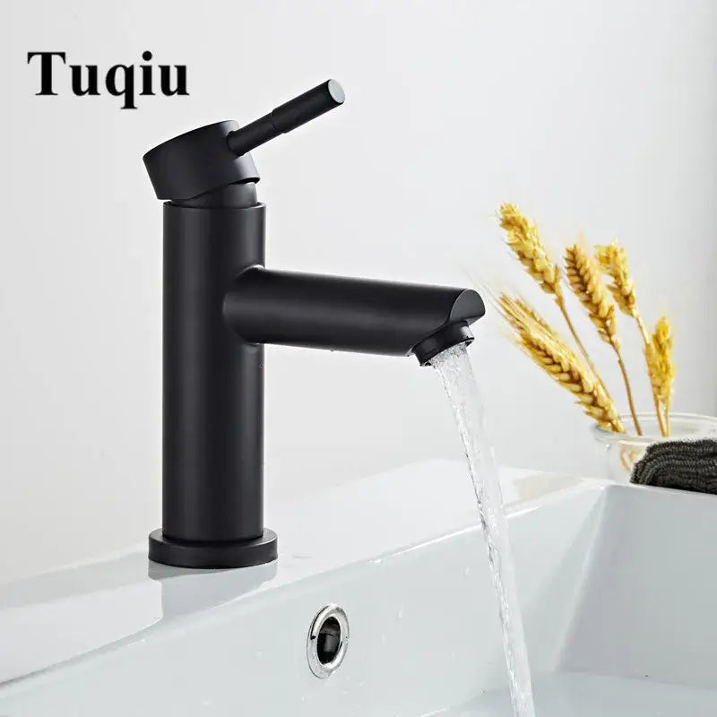 Modern black stainless steel basin faucet with black matte finish and sleek cylindrical design for bathroom decorbites