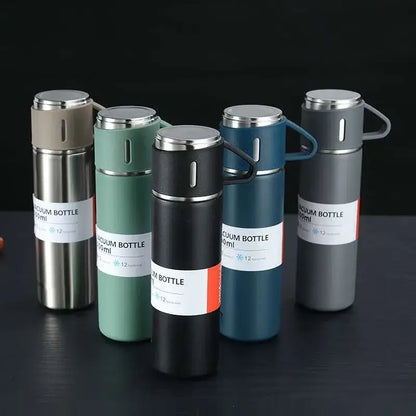 Modern black stainless steel insulated water bottle gift set with five vacuum insulated bottles in matte colors and handles