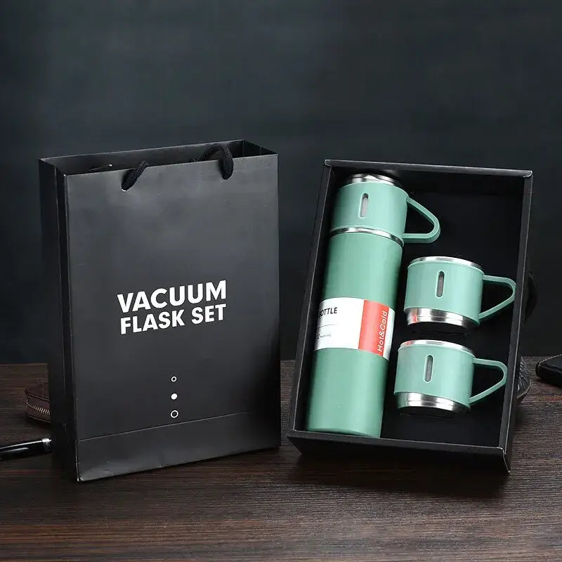 Modern black stainless steel insulated water bottle gift set with mint green vacuum insulated water flask and matching mugs