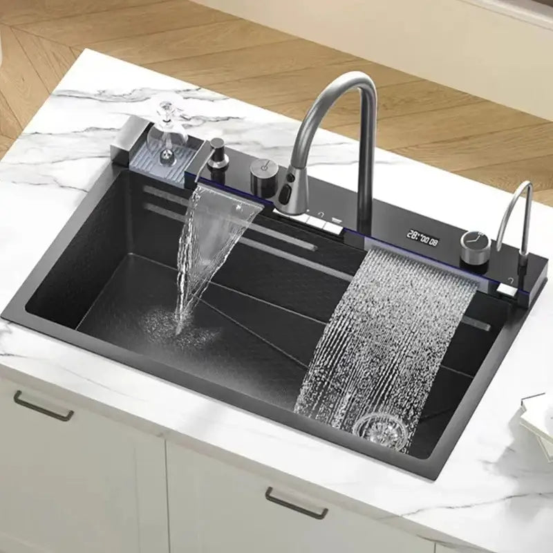 Modern black stainless steel kitchen sink with waterfall faucet and digital display for smart kitchen use