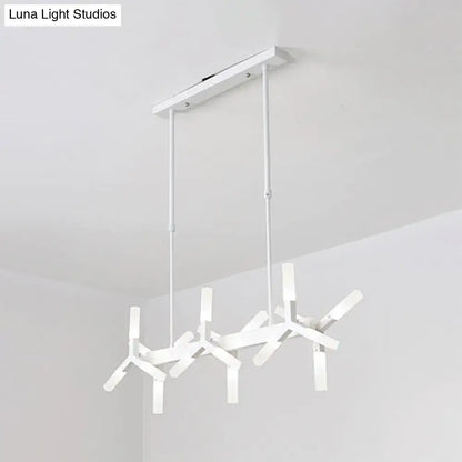 Modern white geometric pendant light with linear acrylic shade and sleek metal finish ideal over dining island