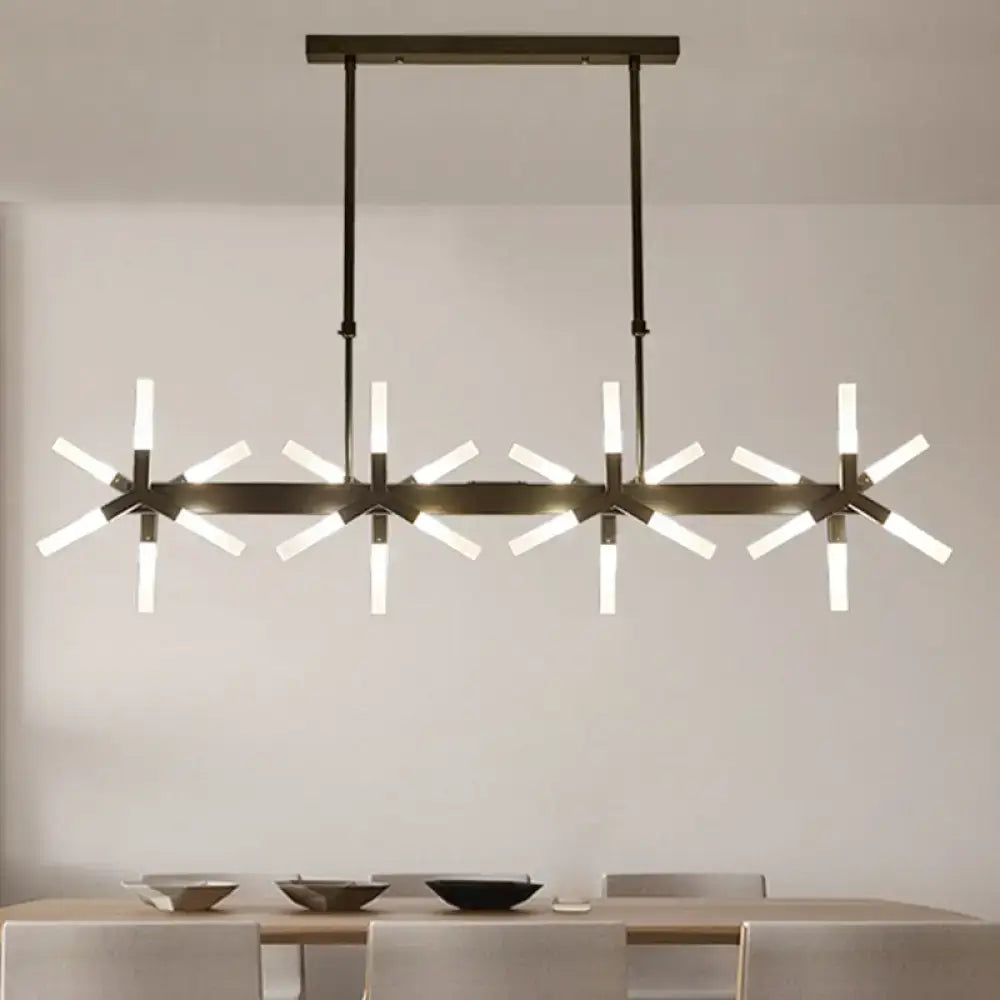 Modern black metal chandelier with multiple starburst-style light fixtures featuring a linear acrylic shade ideal for dining rooms