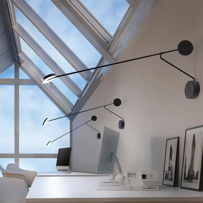 Modern black telescopic wall lamp with articulated arms and circular heads for minimalist bedroom lighting decorbites black telescopic wall