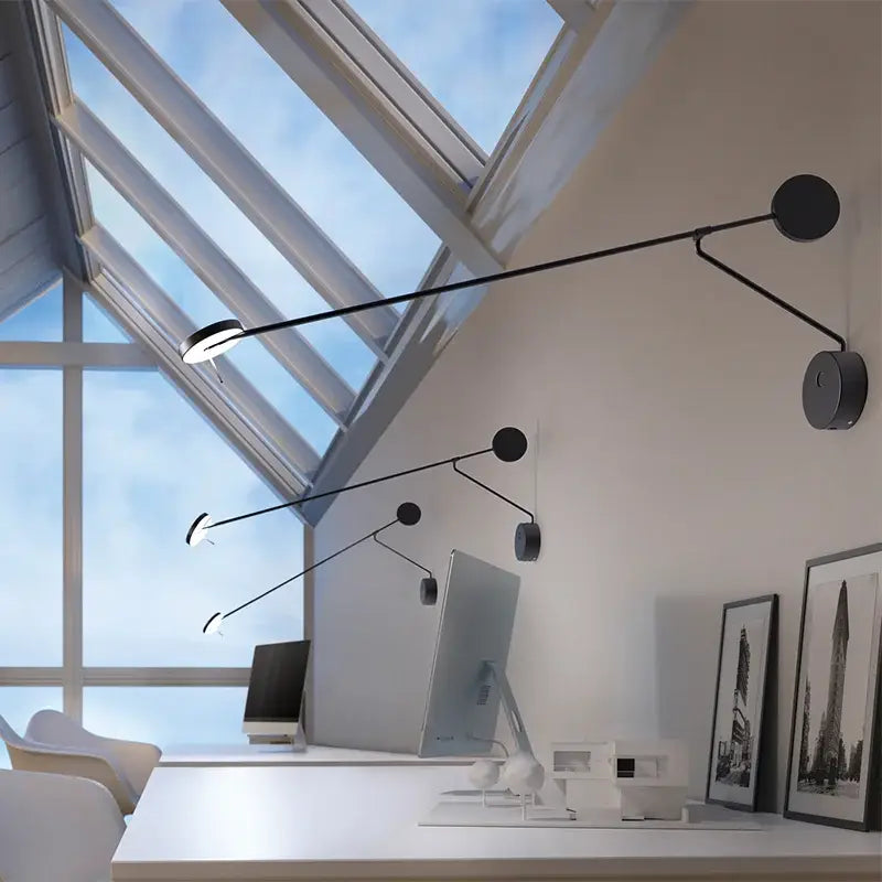 Modern black telescopic wall lamp with articulated arms and circular heads for minimalist bedroom lighting decorbites black telescopic wall