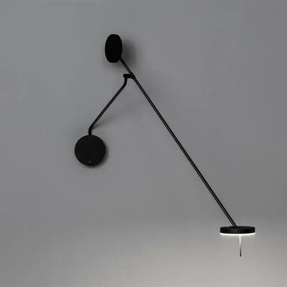 Modern black telescopic wall lamp with articulated arm and circular base emitting soft white light for bedroom decorbites black telescopic wall lamp