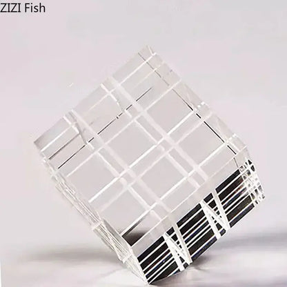 Modern black and transparent acrylic crystal magic cube desk ornament with grid pattern and black striped accents for office decor