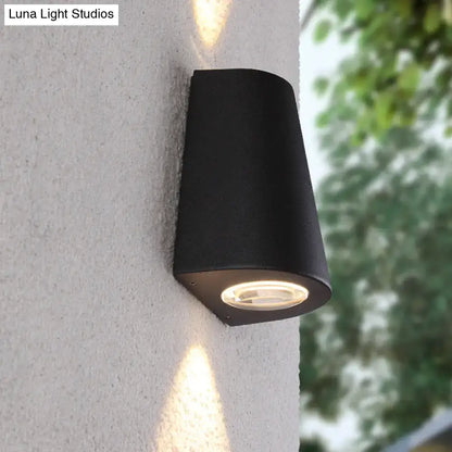 Modern black cylindrical outdoor wall light with warm led and sleek design featuring maximum bulb wattage capacity