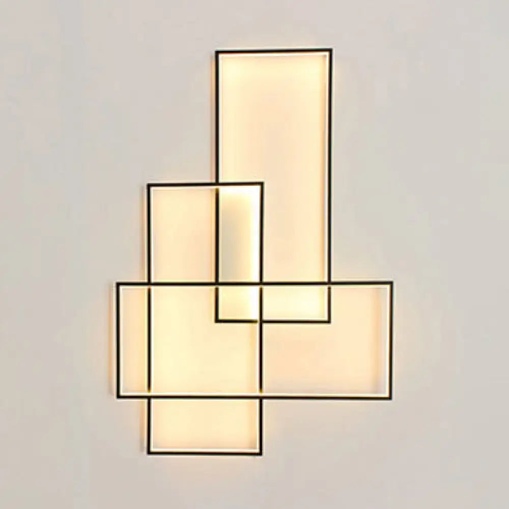 Modern black traverse wall light featuring geometric black metal frames with warm white diffused light panels for living room