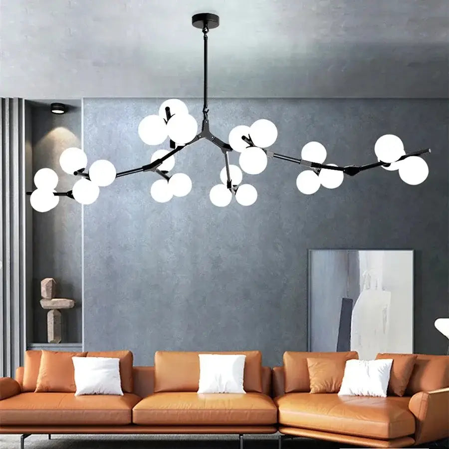 Modern black metal tree branch led ceiling light with spherical white glass globes for dining room illumination