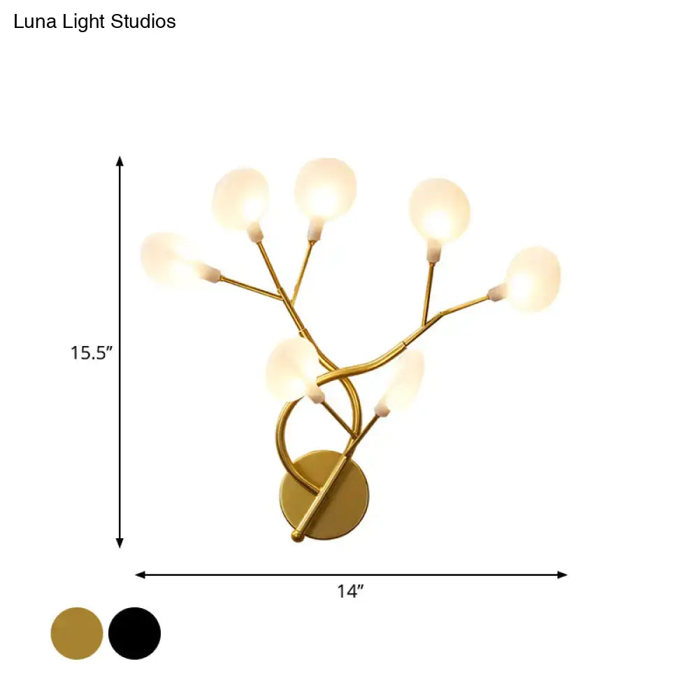 Gold-toned wall light with six frosted glass globe shades in a branching tree design 24 inch fixture for bedroom use