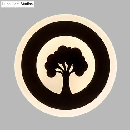 Modern black tree pattern led flush wall sconce featuring a circular logo with concentric rings on an off-white background