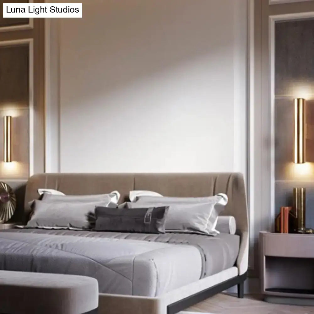 Modern gray upholstered bed with tufted headboard and matching bedding featuring a black wall mounted e26 e27 bedside lamp