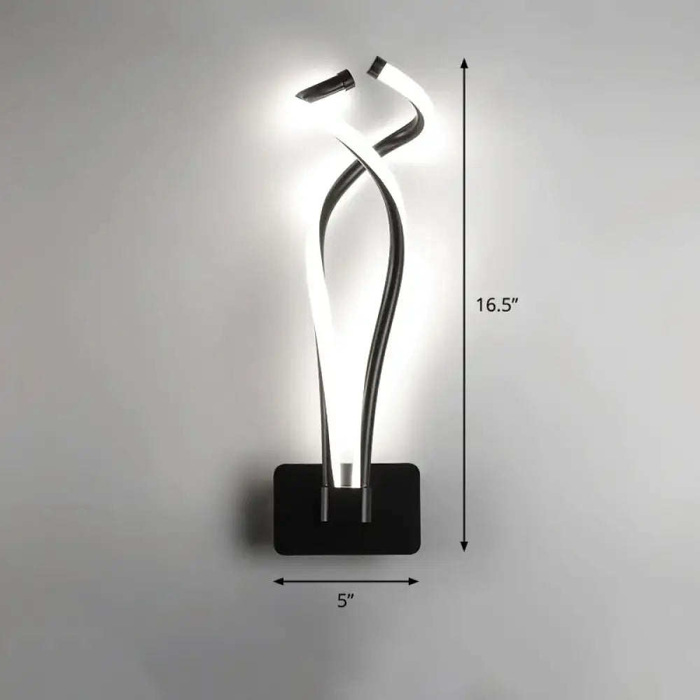 Modern black and white led wall sconce with a sleek sculptural design featuring intertwined illuminated curves for bedroom lighting