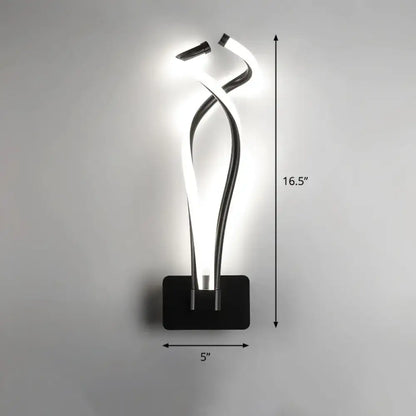 Modern black and white led wall sconce with a sleek sculptural design featuring intertwined illuminated curves for bedroom lighting