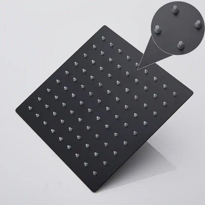 Black matte ultrathin square rainfall shower head with evenly spaced rounded nozzles for modern bathroom use