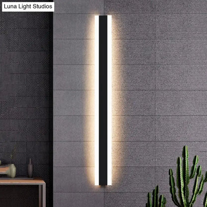 Modern black rectangular led wall sconce with warm ambient lighting ip65 waterproof for living room use