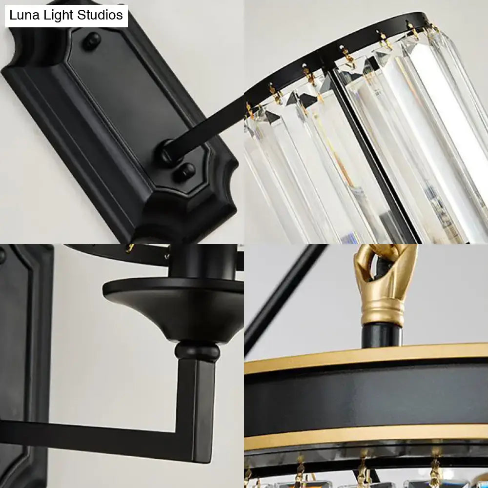 Modern black wall lamp with clear crystal prism and gold accents designed as a corridor wall lamp