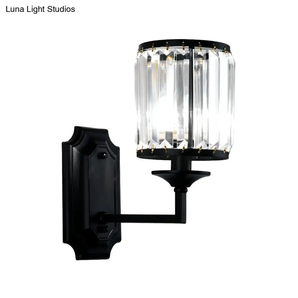 Modern black wrought iron wall lamp with clear crystal prism cylindrical shade for corridor lighting