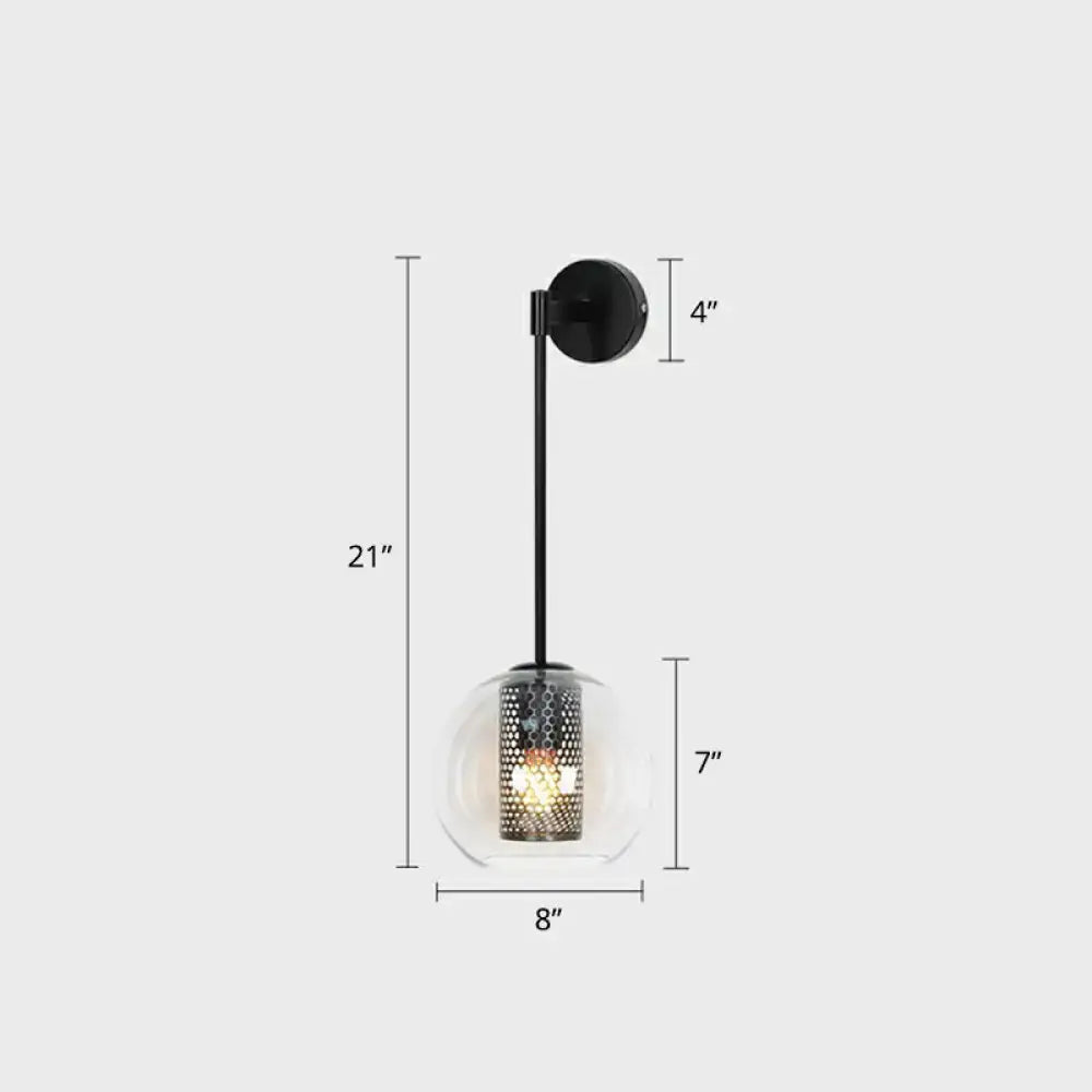 Modern black metal wall sconce with clear glass globe and perforated wire mesh shade for stairway lighting