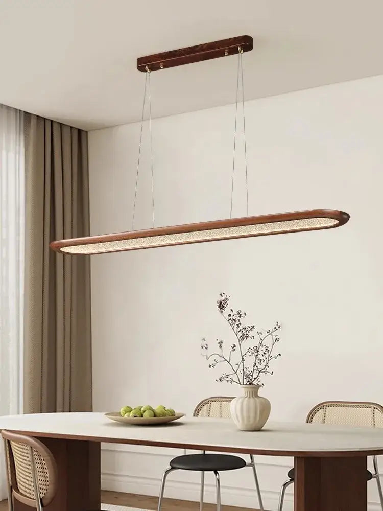 Modern black walnut wooden dining room led pendant lamp with warm wood finish frame and illuminated woven fabric diffuser ceiling chandelier decorbites black walnut