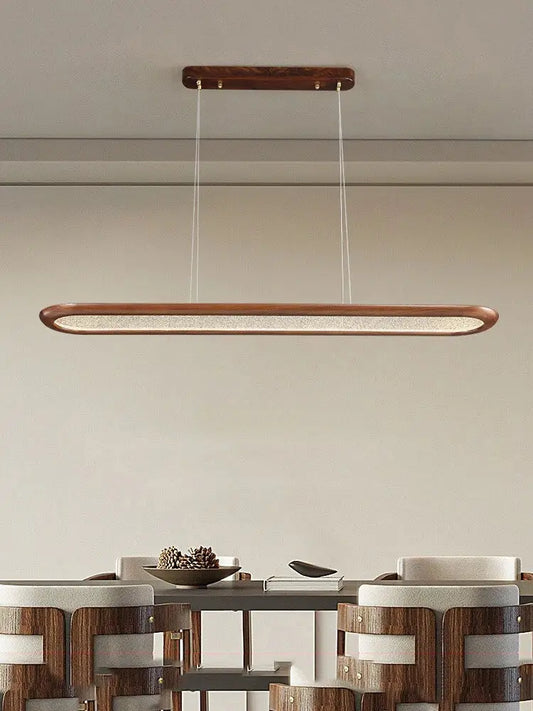 A modern black walnut wooden dining room led pendant lamp with a warm wood finish and diffused glass panel ceiling chandelier