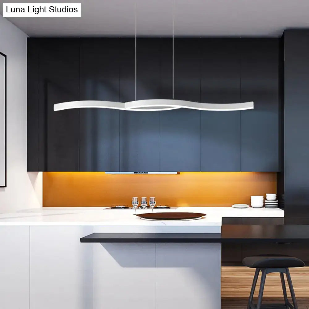 Modern black wave led hanging light fixture with sleek wavy design as kitchen hanging light above island