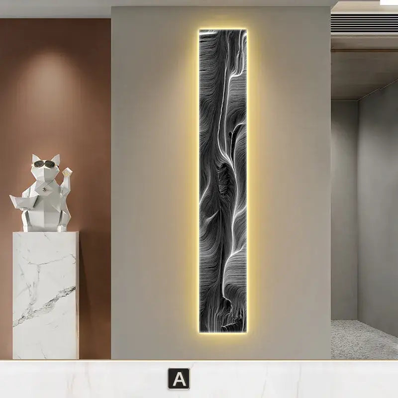 A modern black and white abstract led wall lamp with sleek wave design and warm yellow backlighting for living room decorbites abstract led