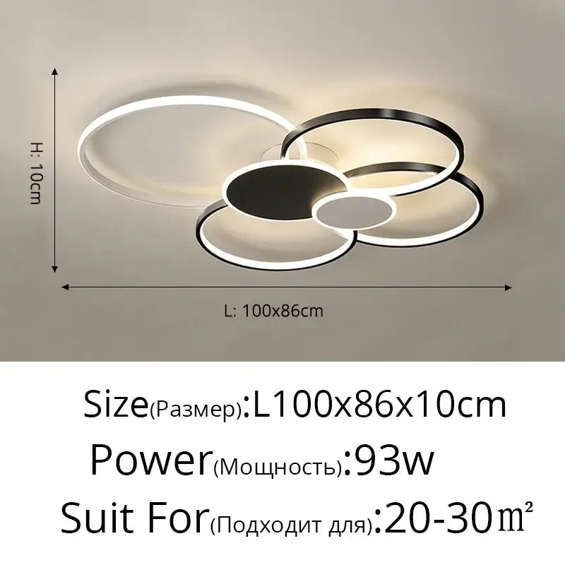 Modern black and white acrylic chandelier light with overlapping circular rings and sleek led design for living room