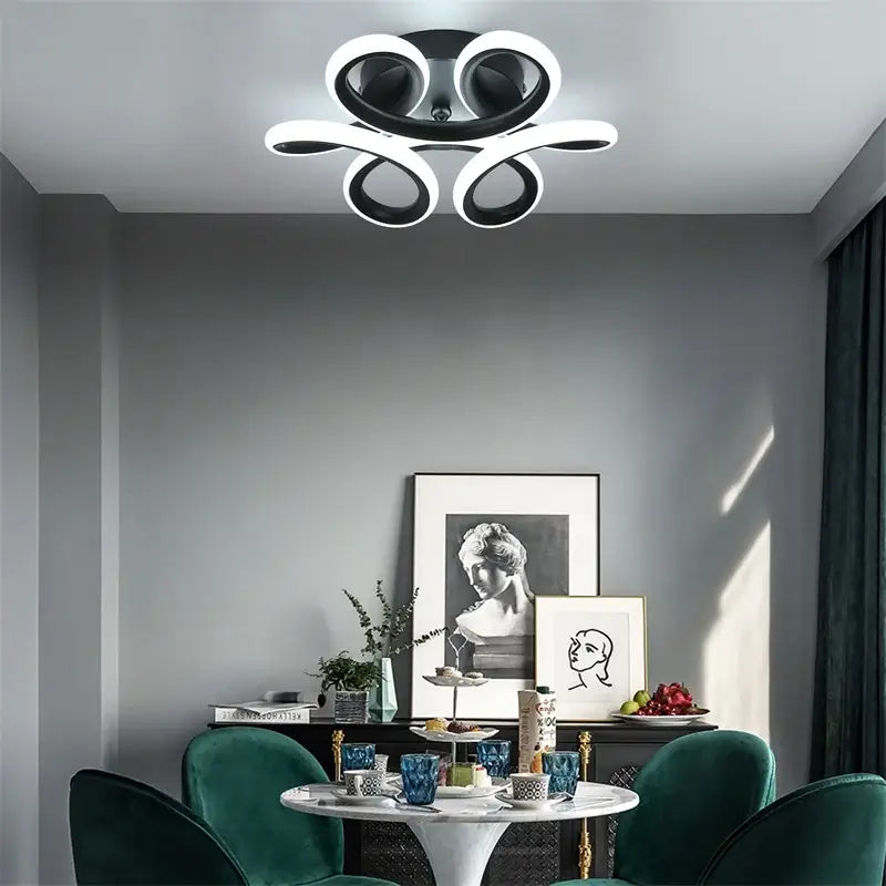 Modern black and white decorbites acrylic led ceiling light with sleek curved ring design for bedroom decor